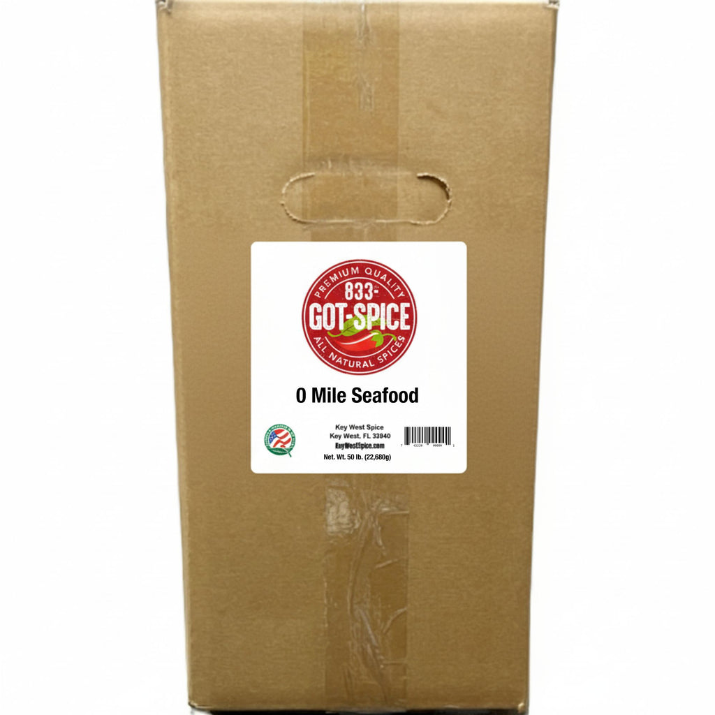 Assorted fresh seafood from 0 Mile Seafood, packaged in bulk, with Key West Spice branding visible on the label.