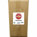Assorted fresh seafood from 0 Mile Seafood, packaged in bulk, with Key West Spice branding visible on the label.