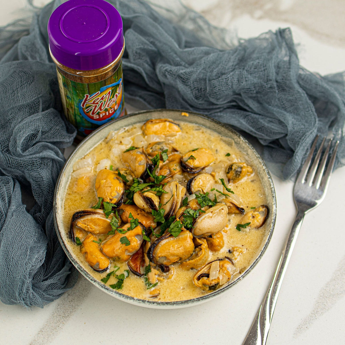 0 Mile Seafood from Key West Spice in a 1.5 oz package, featuring fresh seafood seasoning with vibrant herbs and spices.