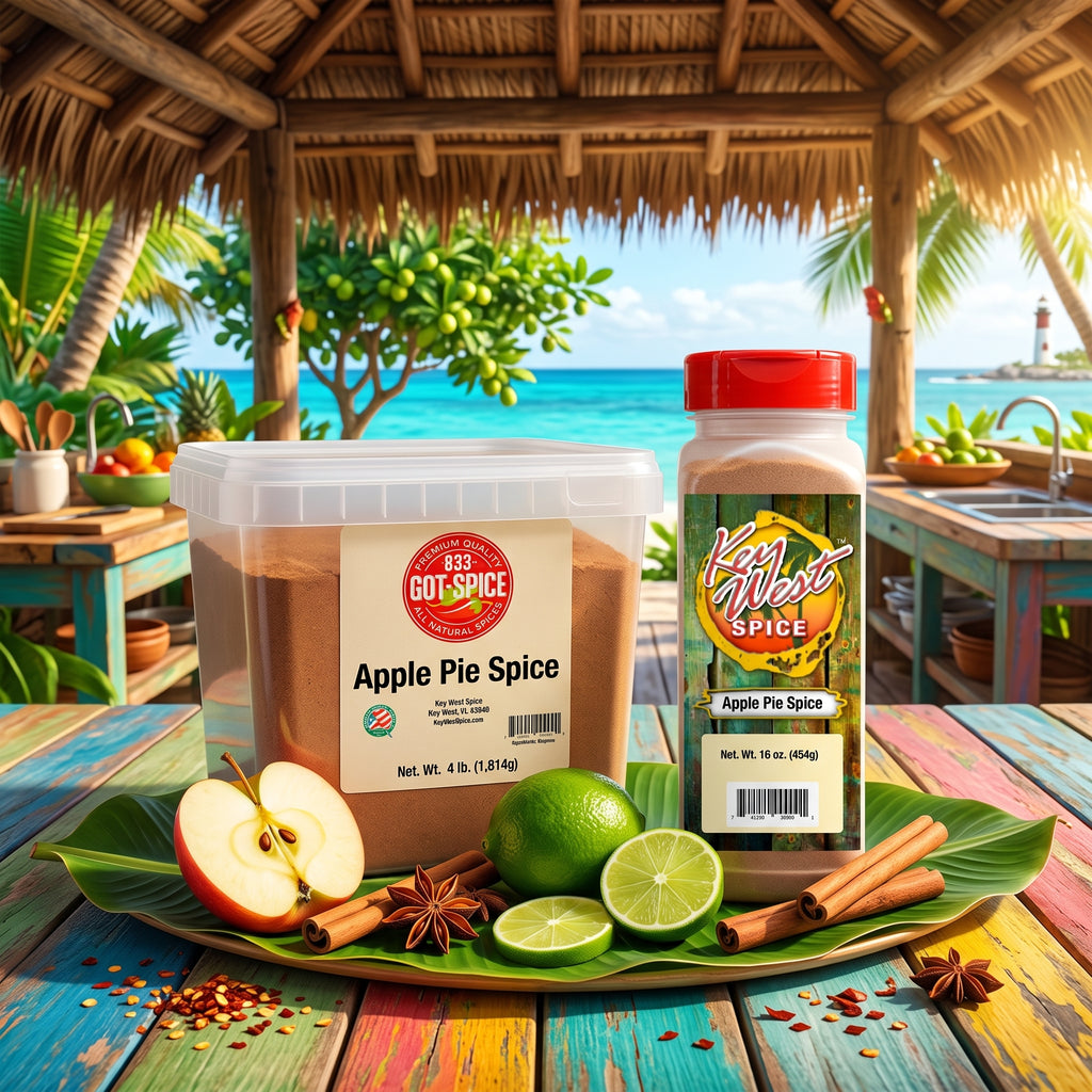 Two jars Apple Pie Spice displayed on a tropical beach table under a thatched hut, surrounded by fresh apple slices, limes, cinnamon sticks, and star anise.