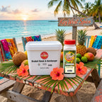 Two spice products displayed on a rustic beach table: a large white tub labeled 'Broiled Steak & Hamburger' and a smaller bottle labeled 'Key West Spice' with a red cap. The scene is styled with tropical fruit, flowers, chairs, and a beach sunset background.