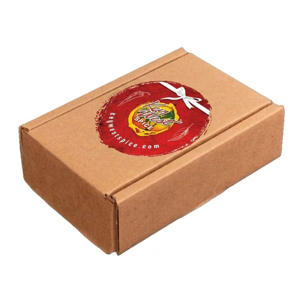 A brown kraft paper shipping box with a circular red and yellow 'Key West Spice' logo sticker on top, set against a plain white background.