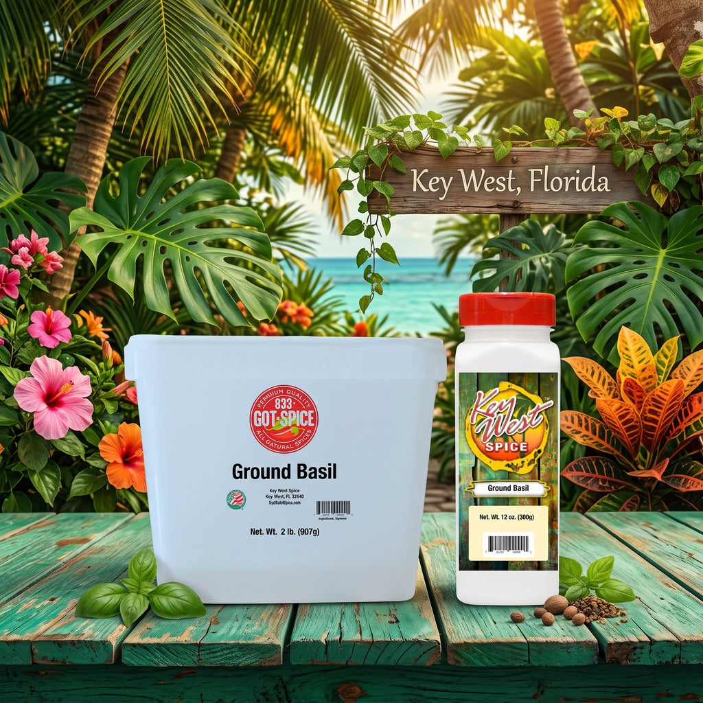 Two containers of Key West Spice Ground Basil displayed on a rustic green wooden table with a tropical Key West, Florida beach and palm tree background. One bag is a large white tub and the other is a smaller white bottle with a red cap.