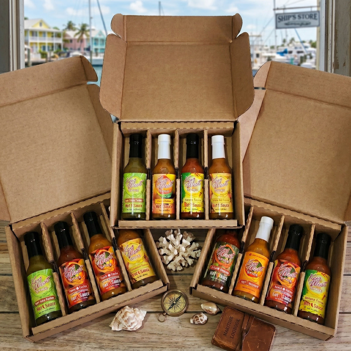 Key West Spice Fusion Hot Sauce Gift Box with four 5 oz bottles, featuring vibrant labels and spicy flavor options.