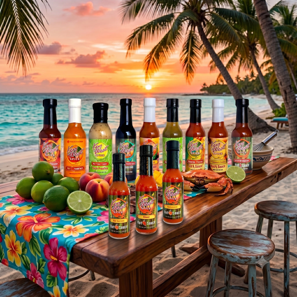 Key West Spice Twelve Sauce Paradise Bundle featuring a variety of flavorful sauce bottles arranged on a table.