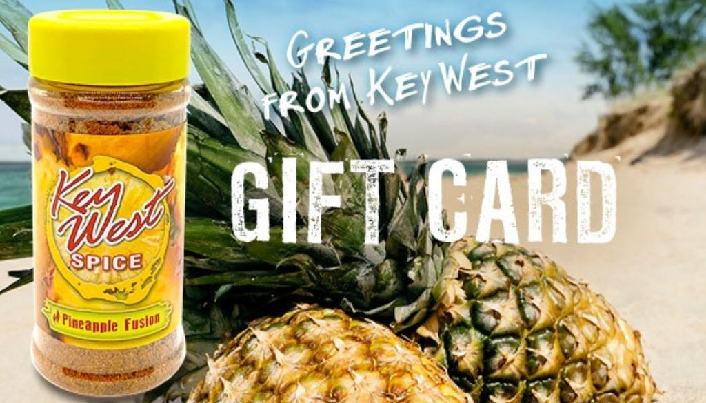 Key West Spice The Gift of Flavor e-gift card displayed on a gift card holder with tropical design elements.