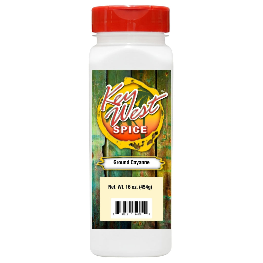 Ground cayenne pepper in a quart container from Key West Spice, showing vibrant red spice with a textured surface.