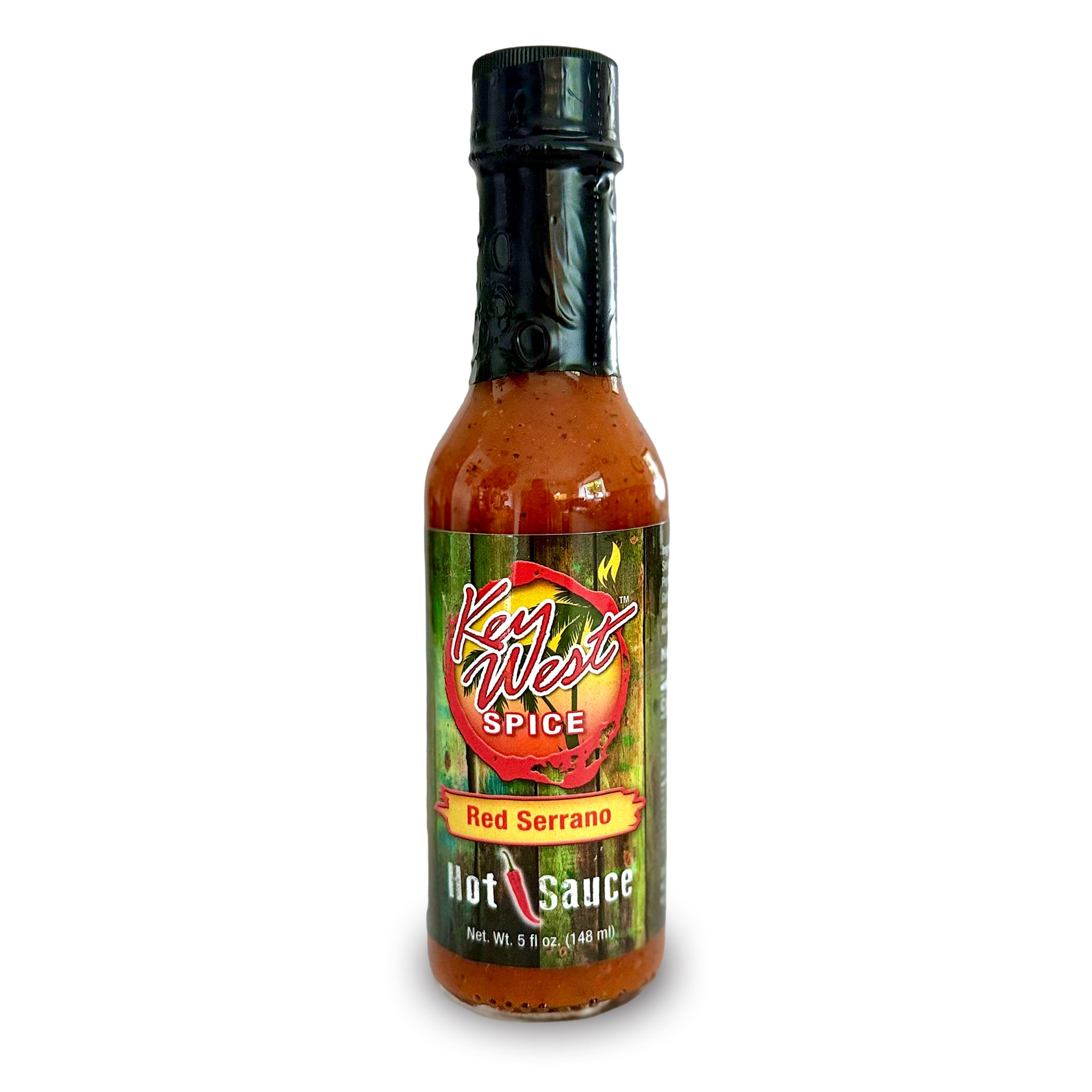 A bottle of Key West Spice Red Serrano Hot Sauce on a white background