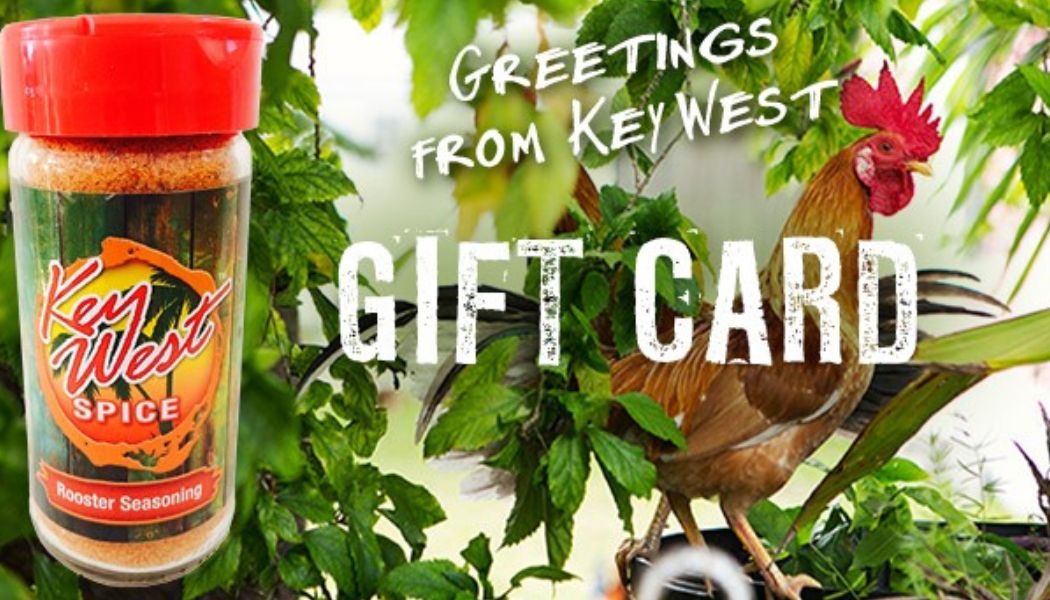 Key West Spice The Gift of Flavor e-gift card displayed on a wooden table with festive decorations.