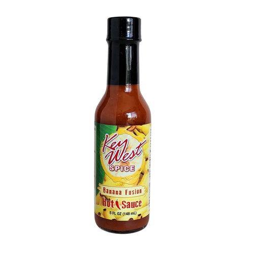 Key West Spice Banana Fusion Hot Sauce bottle, 5 oz., with bright label and spicy, fruity sauce visible in the image.