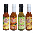 Assorted Key West Spice Fusion Hot Sauces in four 5 oz bottles, featuring vibrant labels and spicy flavors.