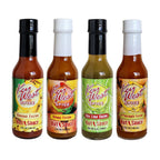 Assorted Key West Spice Fusion Hot Sauces in four 5 oz bottles, featuring vibrant labels and spicy flavors.