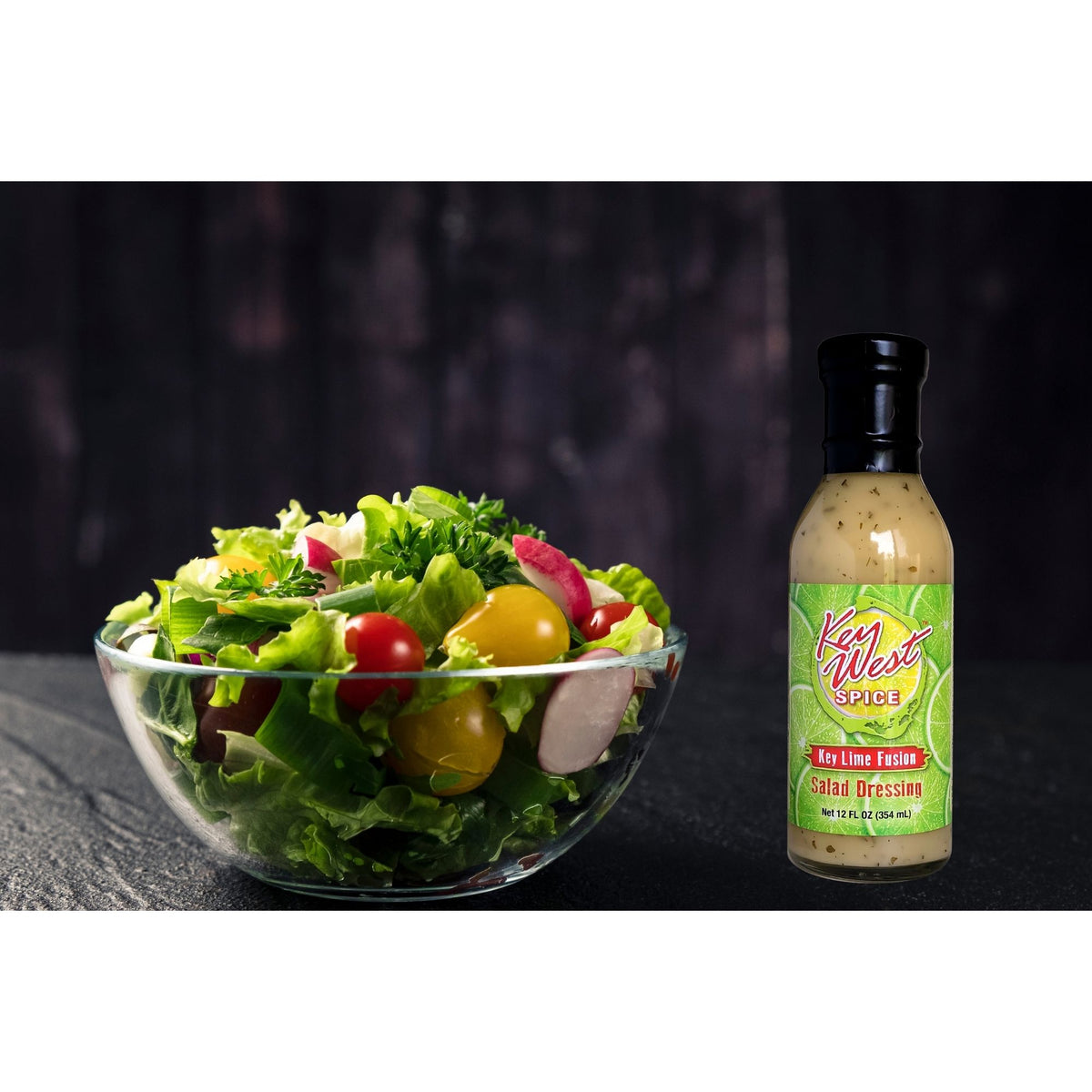 Key West Spice Key Lime Fusion Salad Dressing in a 12 oz bottle, showcasing fresh lime and herb ingredients for vibrant salads.
