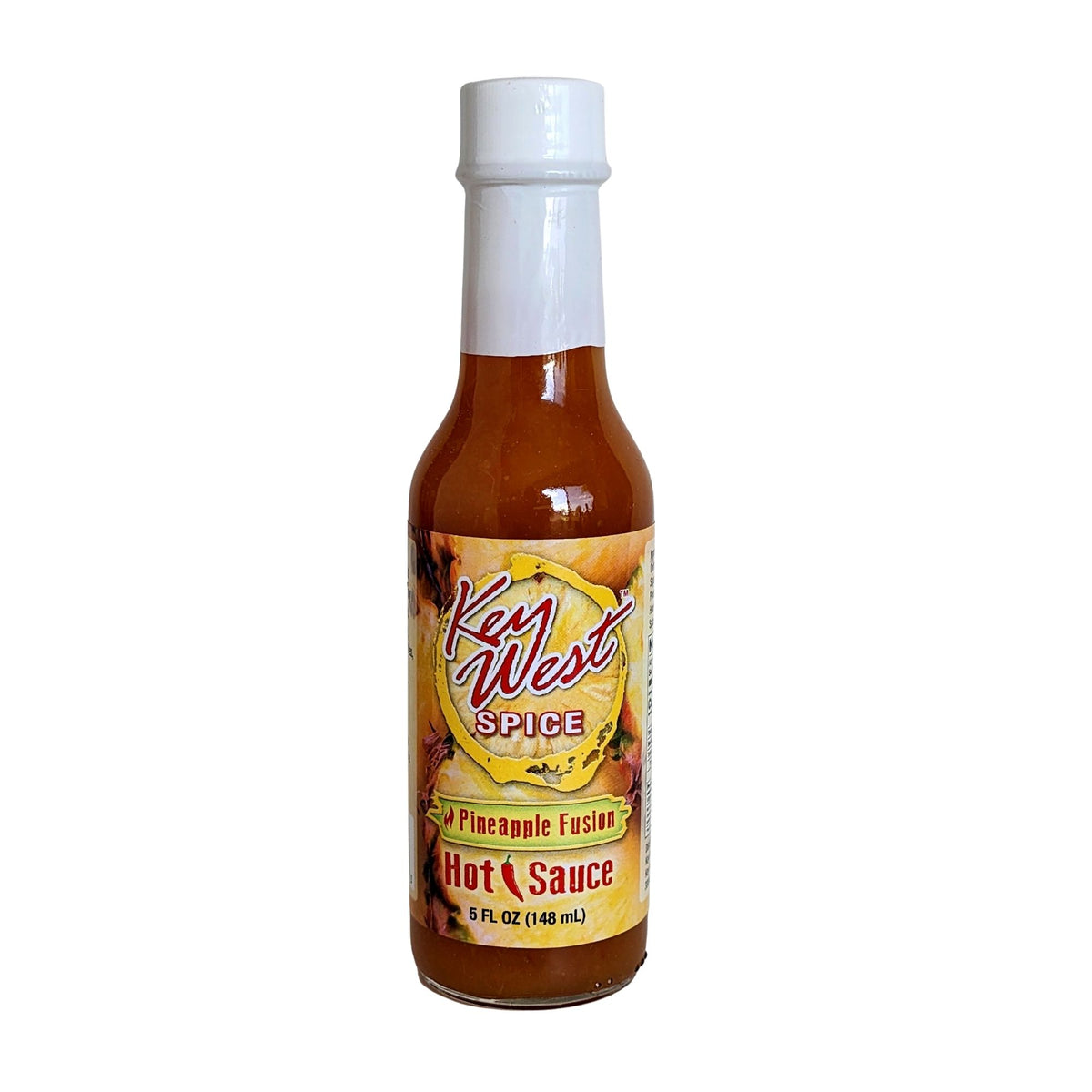 Key West Spice Pineapple Fusion Hot Sauce bottle, 5 oz., featuring a pineapple-themed label and vibrant red hot sauce inside.